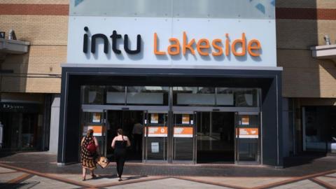 Shoppers entering Intu Lakeside