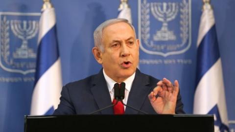 Israel's Prime Minister Benjamin Netanyahu delivers a statement to the members of the media in Tel Aviv, Israel