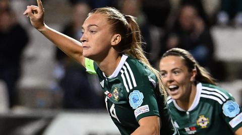 Lauren Wade celebrates scoring a goal