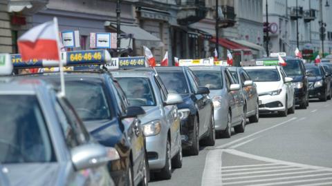 Warsaw taxis crawl along in anti-Uber protest