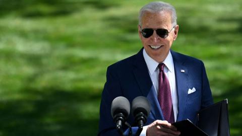 US President Joe Biden arrives to deliver remarks on the Covid-19 response outside the White House in Washington, DC, on 27 April