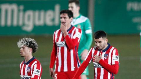 Atletico Madrid players look dejected