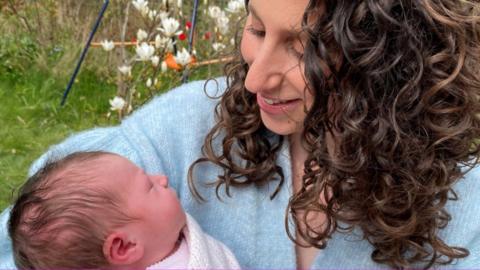 Victoria White with her newborn daughter