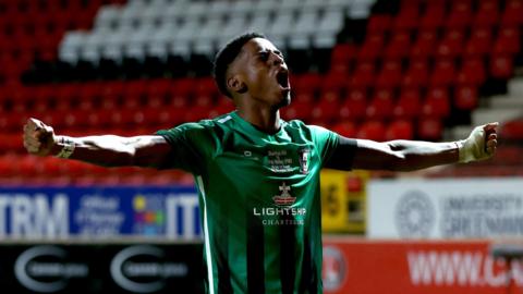 Cray Valley's Kyrell Jeremiah Lisbie celebrates after Charlton Athletic's Lucas Ness scores an own goal during the Emirates FA Cup first round match at The Valley, London.