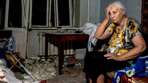 A wounded local resident is seen in her destroyed flat in an apartment building destroyed during a Russian missile strike, amid Russia's attack on Ukraine, in Pokrovsk, Donetsk region, Ukraine, on 8 August 2023