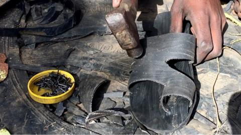 Shoes being made from recycling tyres