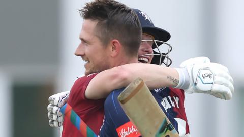 Joe Denly is congratulated by Jordan Cox