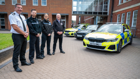 Northampton officers stand opposite cars in the new fleet
