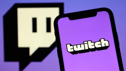 An image of a phone displaying the Twitch logo