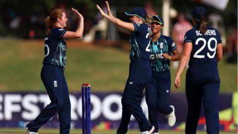 England cricketers celebrating a wicket in the women's Under-19 World Cup