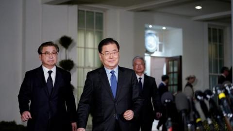 outh Korean National Security Advisor Chung Eui-yong (C) and South Korea National Intelligence Service chief Suh Hoon (L) make their way to brief reporters outside the West Wing of the White House on March 8, 2018 in Washington, DC