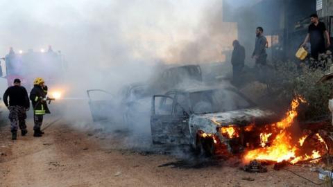 Car ablaze after violence in al-Mughayyir, 12 Apr 24