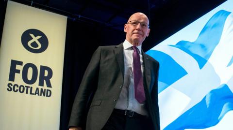 First Minister John Swinney at the SNP Annual National Conference at the Edinburgh International Conference Centre.