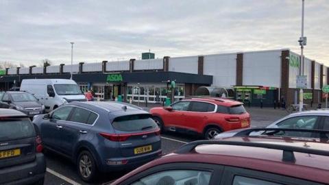 The Asda car park in Dock Road, with the store at the back of the car park