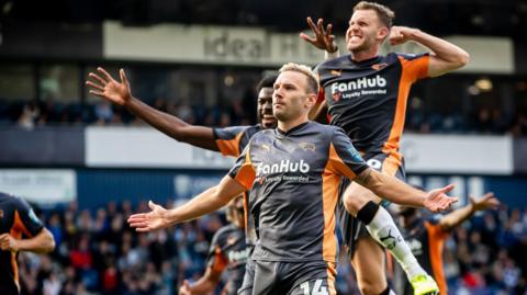 Andi Weimann celebrates his winning goal for Derby at West Brom