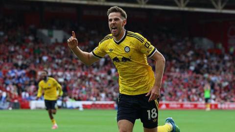 Leeds United's German midfielder #18 Anton Stach celebrates after scoring the opening goal during the English Premier League football match between Nottingham Forest and Leeds United.