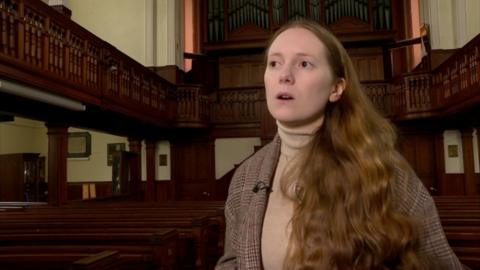 Laura stands in Carmarthen's Penuel Chapel