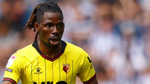 Tom Dele-Bashiru in action for Watford