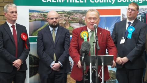 Caerphilly bi-election candidates stand in a row