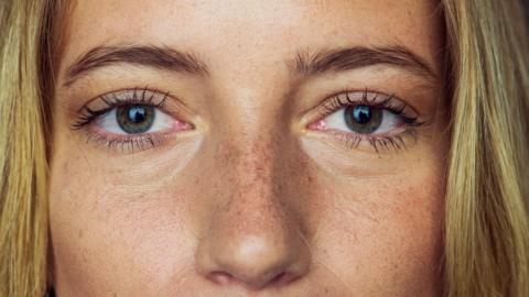 A close-up of a woman's eyes