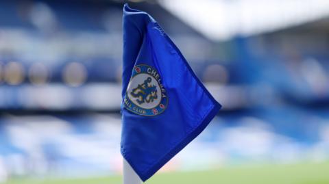 A corner flag with the Chelsea crest on