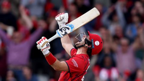Lancashire's Liam Livingstone with his arms aloft as he roars in triumph