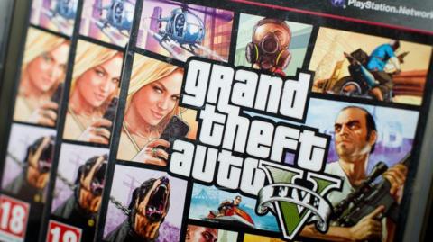 Grand Theft Auto game cover on shop shelf