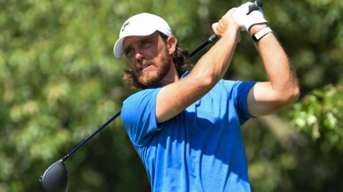 Tommy Fleetwood plays a shot