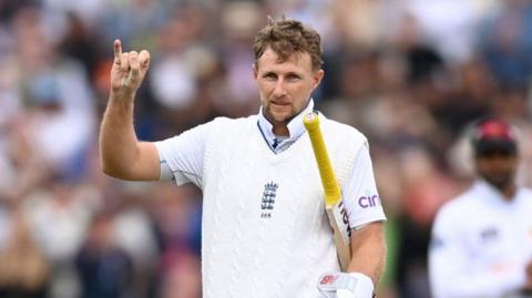 Joe Root celebrates hitting a record 34th Test century for England