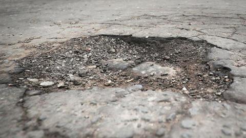 Close up image of a pothole