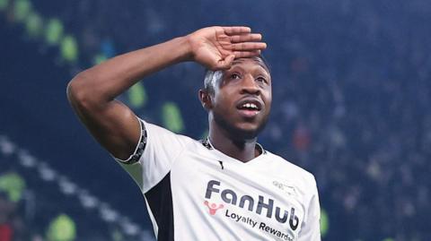 Ebou Adams celebrates his goal for Derby against Portsmouth