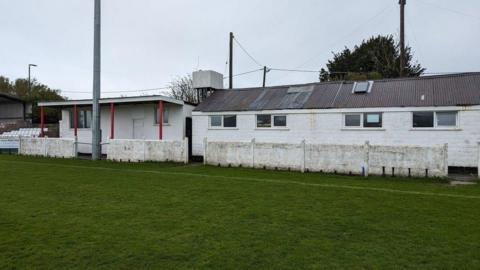 A view of the Frome Town FC building from the pitch