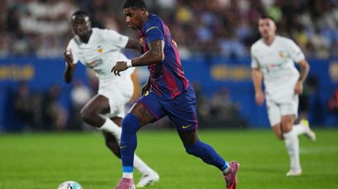 Marcus Rashford scoring for Barcelona