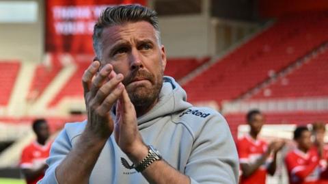 Rob Edwards clapping Boro fans