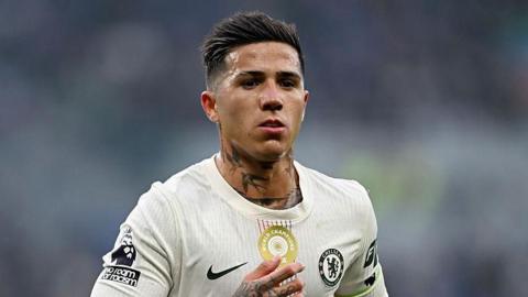 Enzo Fernandez wearing a white Chelsea shirt