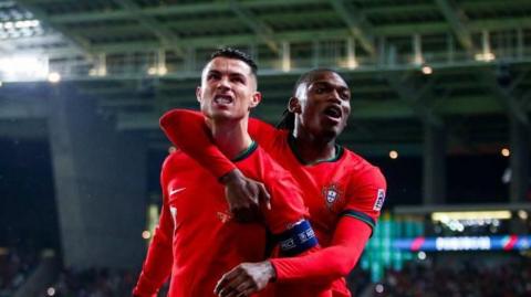 Cristiano Ronaldo celebrates while playing for Portugal