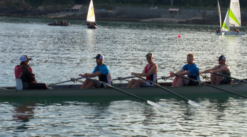 Nicky Will leading as cox a team of four rowers in Havelet Bay