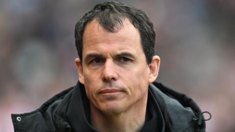Regis Le Bris on the touchline
