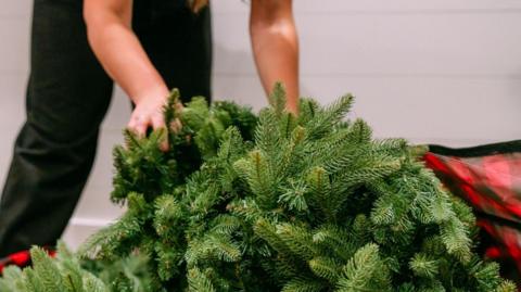 ARtificial Christmas tree being taken out of a box