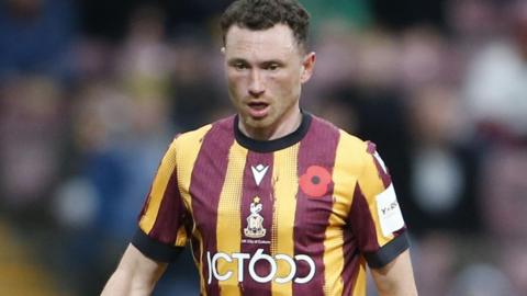 Corry Evans in action for Bradford City