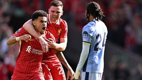 Luiz Diaz celebrates Liverpool's first goal