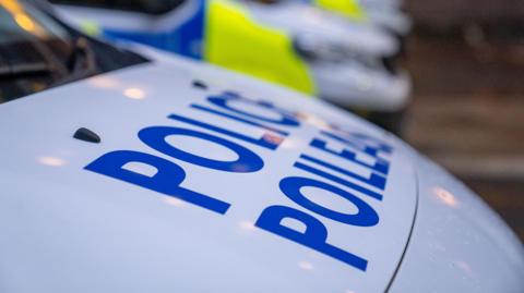 A close up of the bonnet of a police van
