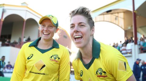 Healy and Villani share a joke