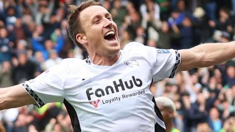 Craig Forsyth celebrates scoring a goal for Derby