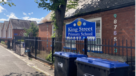 A primary school has a sign outside 