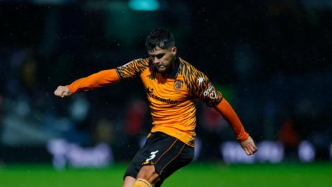 Ryan Giles about to cross