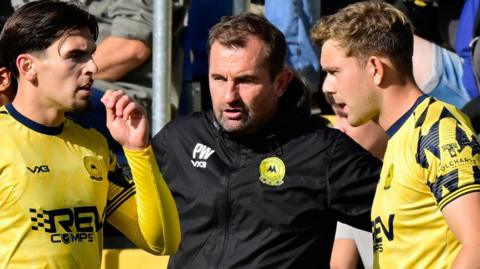 Paul Wotton speaks to his players