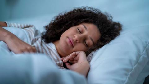 A woman sleeping in a calm atmosphere 