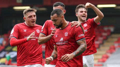 Crewe celebrate Kane Hemmings' winner against Morecambe