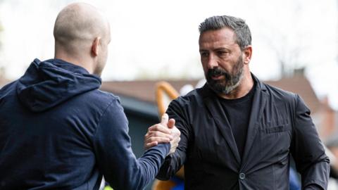 Steven Naismith shakes hands with Kilmarnock manager Derek McInnes